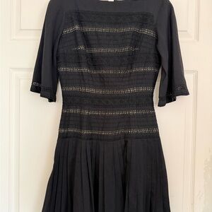 Chic Black Lace Midi Dress with Pleated Skirt